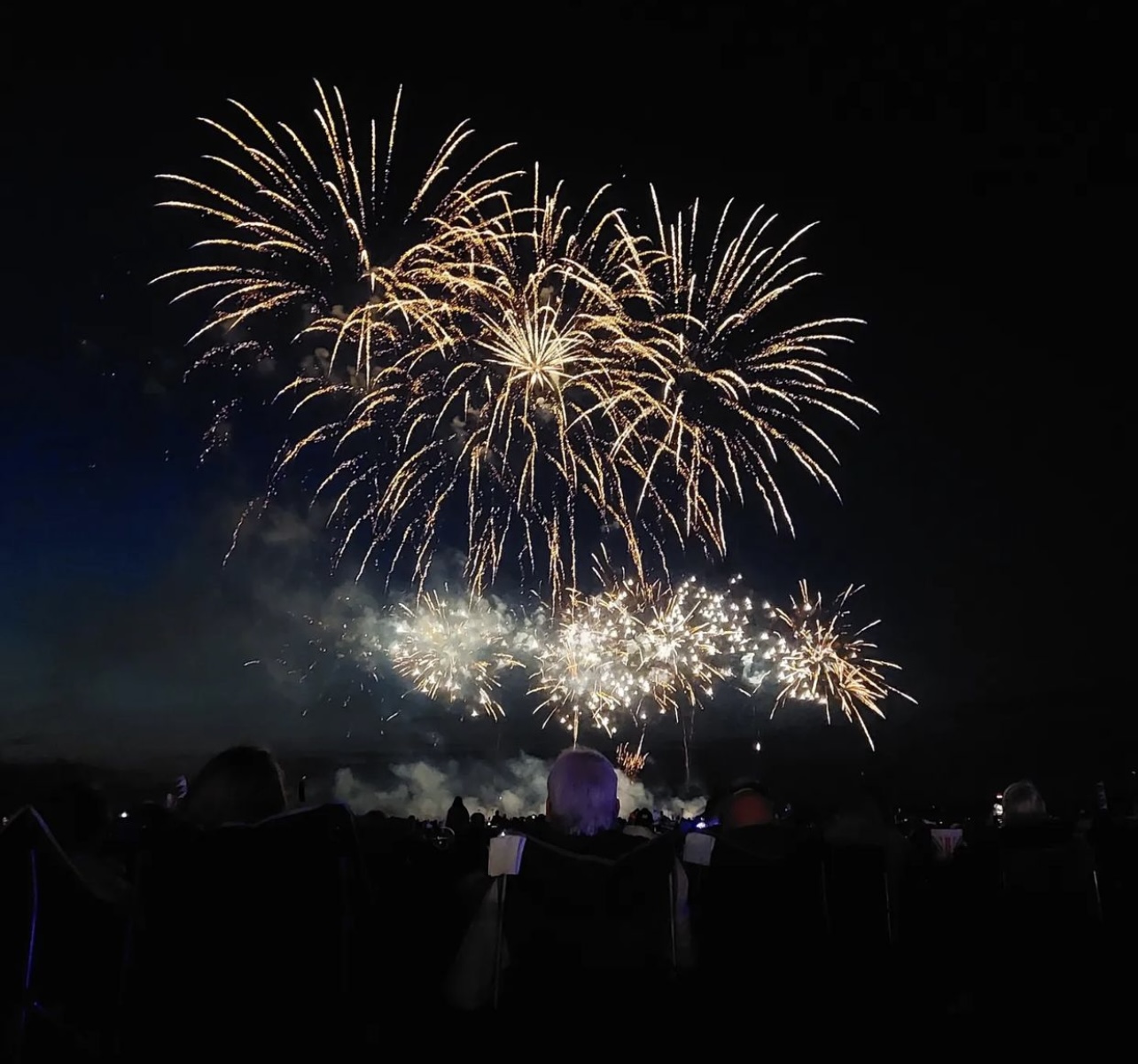 Dense finale fireworks bursting overhead